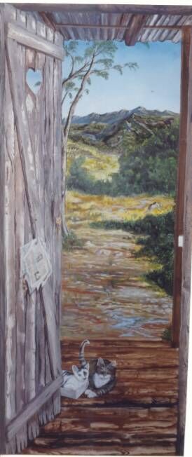 Painting on back of toilet door